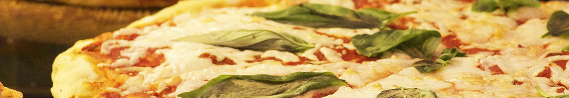 Eating Italian Pizza at Paisano's restaurant in Woodbridge, VA.